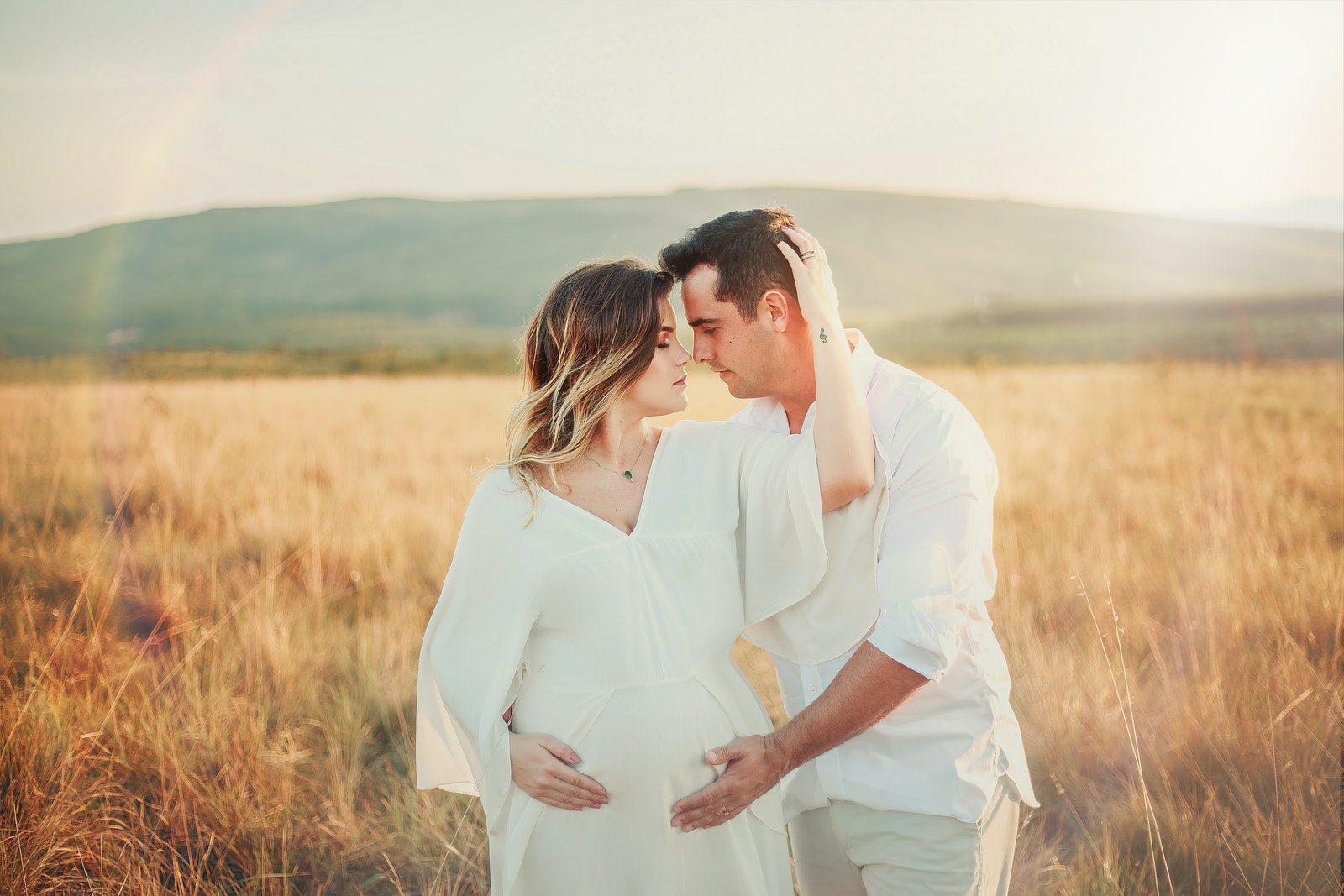 Couple in Field (Photo by Georgia Maciel)